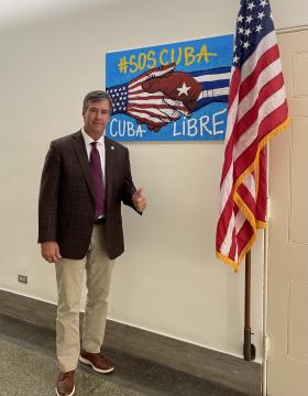 RepMooreCubaSign